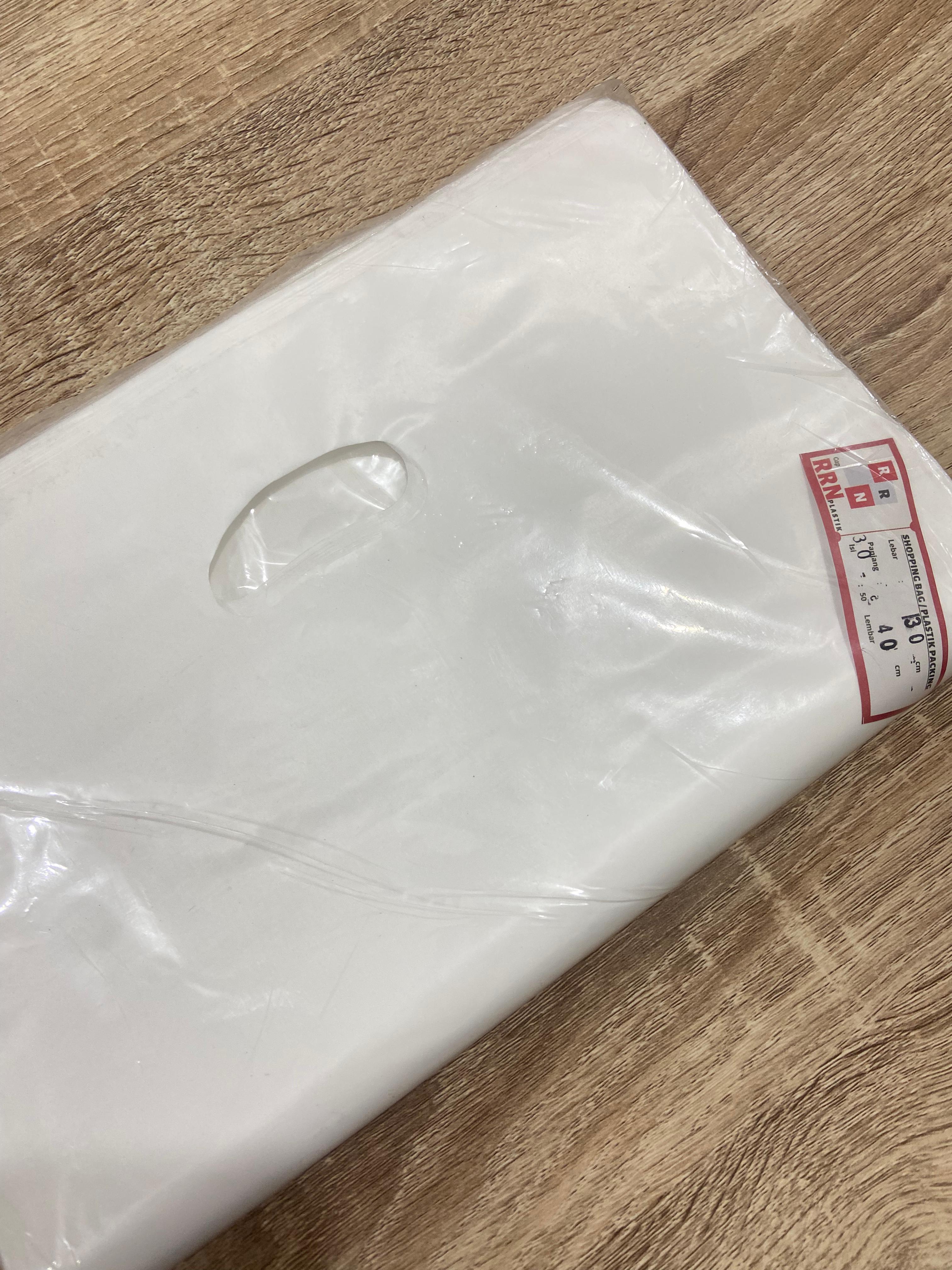 Plastik Packing Putih plong 30 x 40 Pack